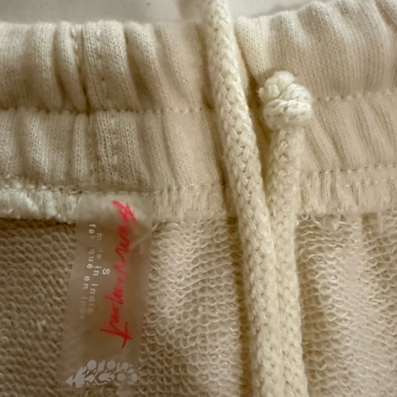 Free People Movement All Star Logo Pants in a cream color. - Picture 9 of 9